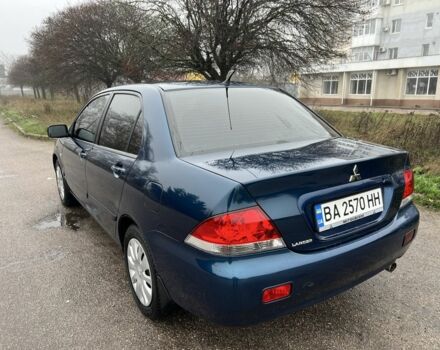 Синій Міцубісі Lancer, об'ємом двигуна 1.6 л та пробігом 126 тис. км за 5950 $, фото 4 на Automoto.ua
