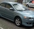 Синий Мицубиси Лансер, объемом двигателя 2 л и пробегом 300 тыс. км за 5600 $, фото 3 на Automoto.ua