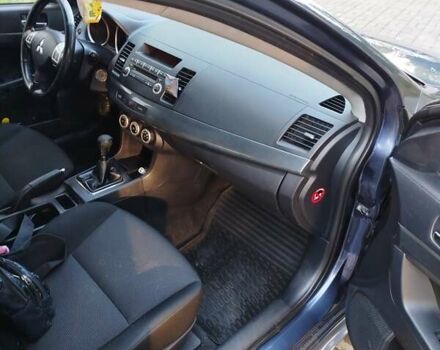 Синій Міцубісі Lancer, об'ємом двигуна 2 л та пробігом 290 тис. км за 5000 $, фото 7 на Automoto.ua