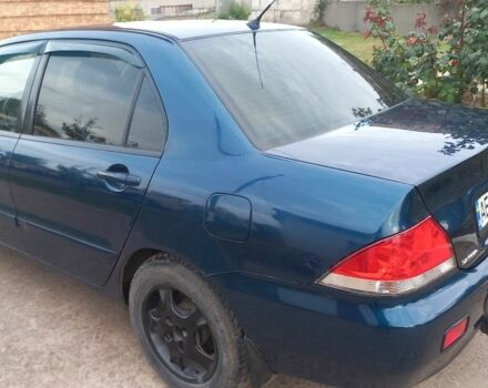 Синій Міцубісі Lancer, об'ємом двигуна 1.6 л та пробігом 220 тис. км за 4200 $, фото 7 на Automoto.ua