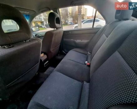 Синій Міцубісі Lancer, об'ємом двигуна 1.6 л та пробігом 298 тис. км за 2998 $, фото 6 на Automoto.ua