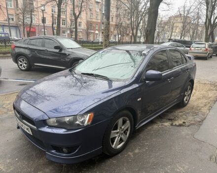 Синий Мицубиси Лансер, объемом двигателя 2 л и пробегом 200 тыс. км за 6700 $, фото 1 на Automoto.ua