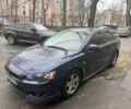 Синий Мицубиси Лансер, объемом двигателя 2 л и пробегом 200 тыс. км за 6700 $, фото 1 на Automoto.ua