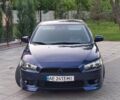 Синій Міцубісі Lancer, об'ємом двигуна 1.8 л та пробігом 223 тис. км за 7100 $, фото 1 на Automoto.ua