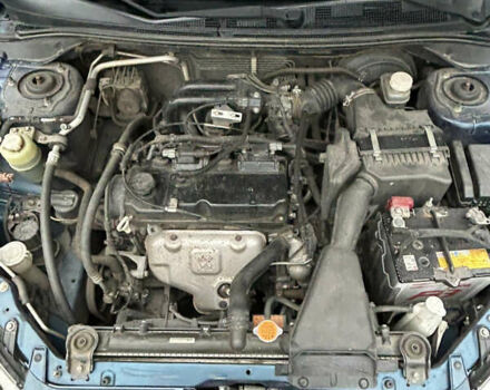 Синий Мицубиси Лансер, объемом двигателя 1.6 л и пробегом 150 тыс. км за 5700 $, фото 21 на Automoto.ua