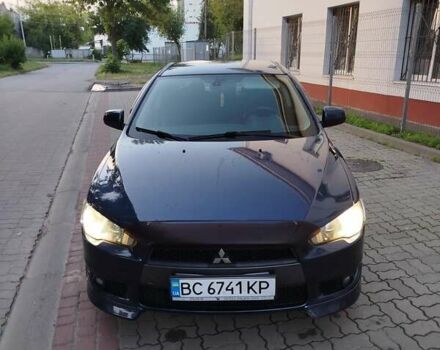 Синій Міцубісі Lancer, об'ємом двигуна 2 л та пробігом 290 тис. км за 5000 $, фото 6 на Automoto.ua