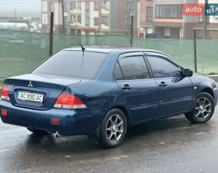Синий Мицубиси Лансер, объемом двигателя 1.6 л и пробегом 187 тыс. км за 3799 $, фото 14 на Automoto.ua