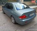 Синий Мицубиси Лансер, объемом двигателя 1.58 л и пробегом 168 тыс. км за 5700 $, фото 7 на Automoto.ua