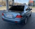 Синий Мицубиси Лансер, объемом двигателя 1.58 л и пробегом 166 тыс. км за 5500 $, фото 12 на Automoto.ua