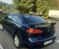Синий Мицубиси Лансер, объемом двигателя 2 л и пробегом 142 тыс. км за 8000 $, фото 2 на Automoto.ua