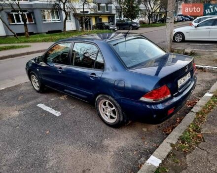 Синій Міцубісі Lancer, об'ємом двигуна 1.6 л та пробігом 298 тис. км за 2998 $, фото 2 на Automoto.ua