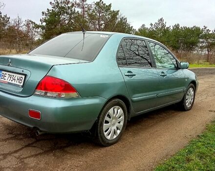 Синій Міцубісі Lancer, об'ємом двигуна 1.6 л та пробігом 167 тис. км за 4700 $, фото 4 на Automoto.ua