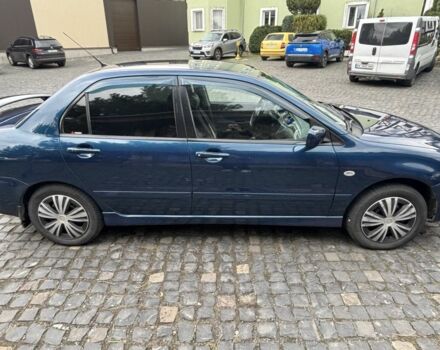 Міцубісі Lancer 2008 у Рівному на Automoto.ua Синій Міцубісі Lancer, об'ємом двигуна 1.6 л та пробігом 158 тис. км за 3900 $, фото 4 на Automoto.ua