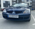 Синій Міцубісі Lancer, об'ємом двигуна 1.6 л та пробігом 206 тис. км за 5500 $, фото 1 на Automoto.ua