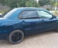 Синій Міцубісі Lancer, об'ємом двигуна 1.6 л та пробігом 220 тис. км за 4200 $, фото 1 на Automoto.ua