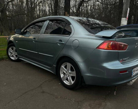 Синий Мицубиси Лансер, объемом двигателя 1.5 л и пробегом 250 тыс. км за 5150 $, фото 4 на Automoto.ua