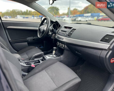 Міцубісі Lancer 2008 у Києві на Automoto.ua Синій Міцубісі Lancer, об'ємом двигуна 2 л та пробігом 265 тис. км за 6250 $, фото 14 на Automoto.ua