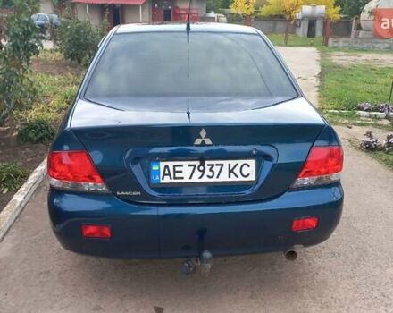 Синій Міцубісі Lancer, об'ємом двигуна 1.58 л та пробігом 220 тис. км за 4200 $, фото 4 на Automoto.ua