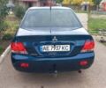 Синій Міцубісі Lancer, об'ємом двигуна 1.58 л та пробігом 220 тис. км за 4200 $, фото 4 на Automoto.ua