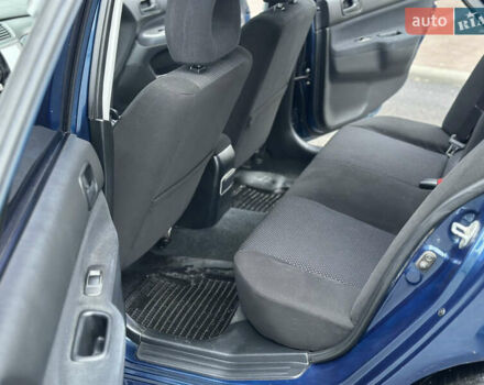 Синий Мицубиси Лансер, объемом двигателя 1.6 л и пробегом 187 тыс. км за 3799 $, фото 18 на Automoto.ua