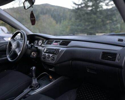 Синий Мицубиси Лансер, объемом двигателя 1.6 л и пробегом 138 тыс. км за 4800 $, фото 15 на Automoto.ua