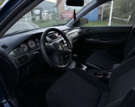 Синий Мицубиси Лансер, объемом двигателя 1.6 л и пробегом 138 тыс. км за 4800 $, фото 13 на Automoto.ua