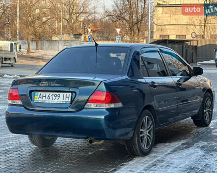 Синій Міцубісі Lancer, об'ємом двигуна 1.6 л та пробігом 250 тис. км за 5499 $, фото 6 на Automoto.ua