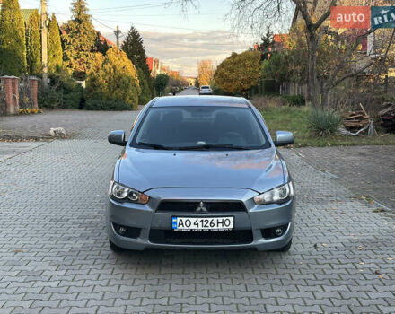 Синий Мицубиси Лансер, объемом двигателя 2 л и пробегом 320 тыс. км за 4999 $, фото 1 на Automoto.ua