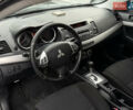 Міцубісі Lancer 2009 у Ужгороді на Automoto.ua Синій Міцубісі Lancer, об'ємом двигуна 2 л та пробігом 320 тис. км за 4999 $, фото 6 на Automoto.ua