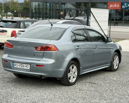 Міцубісі Lancer 2009 у Ужгороді на Automoto.ua Синій Міцубісі Lancer, об'ємом двигуна 2 л та пробігом 320 тис. км за 4999 $, фото 3 на Automoto.ua