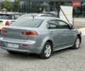 Міцубісі Lancer 2009 у Ужгороді на Automoto.ua Синій Міцубісі Lancer, об'ємом двигуна 2 л та пробігом 320 тис. км за 4999 $, фото 3 на Automoto.ua