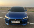 Синій Міцубісі Lancer, об'ємом двигуна 2 л та пробігом 240 тис. км за 3500 $, фото 1 на Automoto.ua