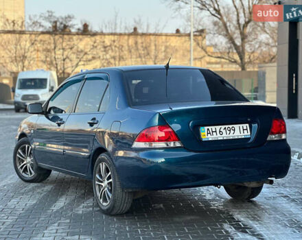 Синій Міцубісі Lancer, об'ємом двигуна 1.6 л та пробігом 250 тис. км за 5499 $, фото 5 на Automoto.ua