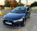 Синий Мицубиси Лансер, объемом двигателя 2 л и пробегом 240 тыс. км за 6600 $, фото 1 на Automoto.ua