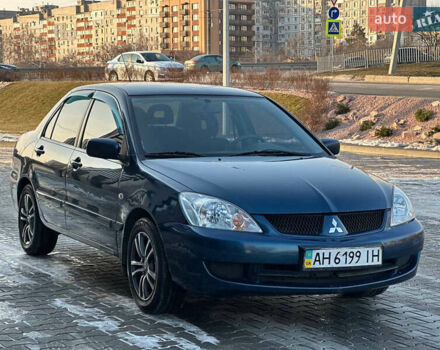 Синій Міцубісі Lancer, об'ємом двигуна 1.6 л та пробігом 250 тис. км за 5499 $, фото 4 на Automoto.ua