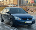 Синій Міцубісі Lancer, об'ємом двигуна 1.6 л та пробігом 250 тис. км за 5499 $, фото 4 на Automoto.ua
