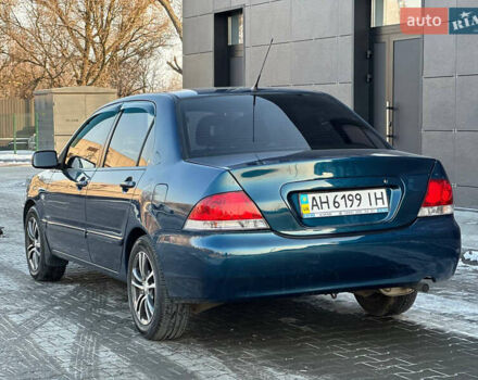 Синій Міцубісі Lancer, об'ємом двигуна 1.6 л та пробігом 250 тис. км за 5499 $, фото 9 на Automoto.ua