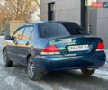 Синій Міцубісі Lancer, об'ємом двигуна 1.6 л та пробігом 250 тис. км за 5499 $, фото 9 на Automoto.ua