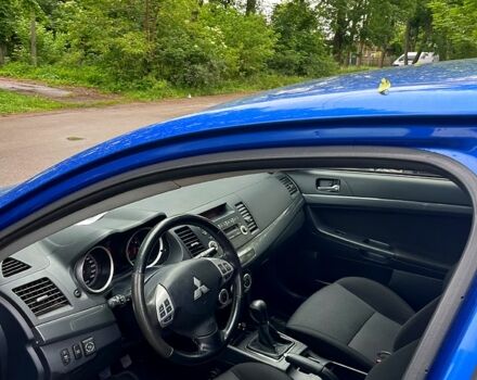Синій Міцубісі Lancer, об'ємом двигуна 2 л та пробігом 195 тис. км за 6700 $, фото 4 на Automoto.ua