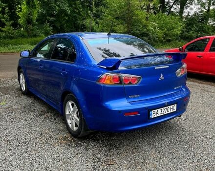 Синій Міцубісі Lancer, об'ємом двигуна 2 л та пробігом 195 тис. км за 6700 $, фото 2 на Automoto.ua
