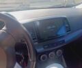 Синій Міцубісі Lancer, об'ємом двигуна 2 л та пробігом 237 тис. км за 6267 $, фото 9 на Automoto.ua
