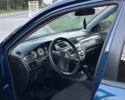 Синий Мицубиси Лансер, объемом двигателя 1.6 л и пробегом 138 тыс. км за 4800 $, фото 12 на Automoto.ua