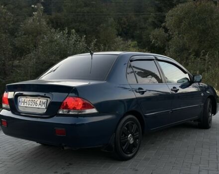 Синий Мицубиси Лансер, объемом двигателя 1.6 л и пробегом 138 тыс. км за 4800 $, фото 7 на Automoto.ua