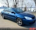 Синий Мицубиси Лансер, объемом двигателя 1.6 л и пробегом 250 тыс. км за 4999 $, фото 5 на Automoto.ua