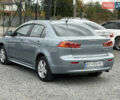 Міцубісі Lancer 2009 у Ужгороді на Automoto.ua Синій Міцубісі Lancer, об'ємом двигуна 2 л та пробігом 320 тис. км за 4999 $, фото 4 на Automoto.ua