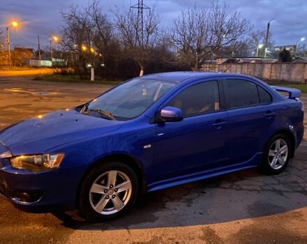 Синий Мицубиси Лансер, объемом двигателя 2 л и пробегом 176 тыс. км за 5300 $, фото 2 на Automoto.ua