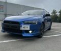 Синий Мицубиси Лансер, объемом двигателя 2 л и пробегом 263 тыс. км за 8200 $, фото 2 на Automoto.ua