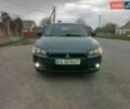 Синій Міцубісі Lancer, об'ємом двигуна 2 л та пробігом 205 тис. км за 6799 $, фото 7 на Automoto.ua