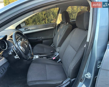 Синий Мицубиси Лансер, объемом двигателя 2 л и пробегом 320 тыс. км за 4999 $, фото 7 на Automoto.ua