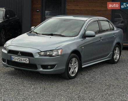 Синий Мицубиси Лансер, объемом двигателя 2 л и пробегом 320 тыс. км за 4900 $, фото 1 на Automoto.ua